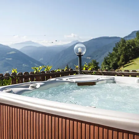 Grumer Suites&spa 4* Soprabolzano